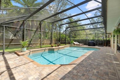Elegant Pool Home in Glen Eagle in Winter Springs. Situated on a on Tuscawilla Country Club in Florida - for sale on GolfHomes.com, golf home, golf lot