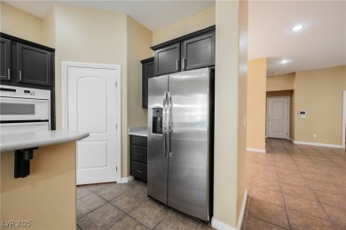 Live a Luxury Lifestyle in Tudor Park at Queensridge. Step into on Badlands Golf Club in Nevada - for sale on GolfHomes.com, golf home, golf lot
