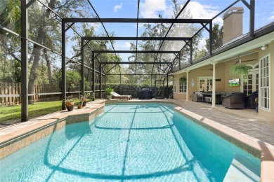 Elegant Pool Home in Glen Eagle in Winter Springs. Situated on a on Tuscawilla Country Club in Florida - for sale on GolfHomes.com, golf home, golf lot