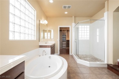 Live a Luxury Lifestyle in Tudor Park at Queensridge. Step into on Badlands Golf Club in Nevada - for sale on GolfHomes.com, golf home, golf lot