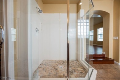 Live a Luxury Lifestyle in Tudor Park at Queensridge. Step into on Badlands Golf Club in Nevada - for sale on GolfHomes.com, golf home, golf lot