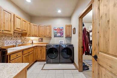 Come explore this stunning single-level residence on the 10th on Eagle Bend Golf Course in Montana - for sale on GolfHomes.com, golf home, golf lot