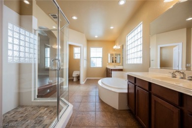 Live a Luxury Lifestyle in Tudor Park at Queensridge. Step into on Badlands Golf Club in Nevada - for sale on GolfHomes.com, golf home, golf lot