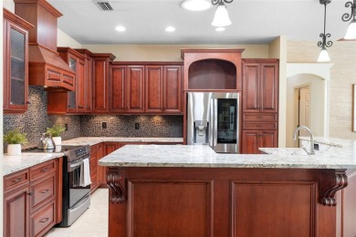 Elegant Pool Home in Glen Eagle in Winter Springs. Situated on a on Tuscawilla Country Club in Florida - for sale on GolfHomes.com, golf home, golf lot