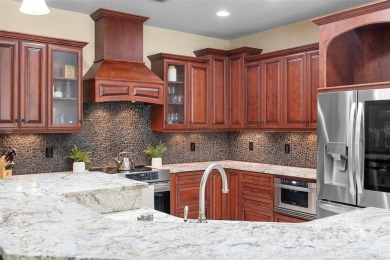 Elegant Pool Home in Glen Eagle in Winter Springs. Situated on a on Tuscawilla Country Club in Florida - for sale on GolfHomes.com, golf home, golf lot
