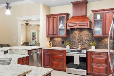 Elegant Pool Home in Glen Eagle in Winter Springs. Situated on a on Tuscawilla Country Club in Florida - for sale on GolfHomes.com, golf home, golf lot