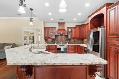 Elegant Pool Home in Glen Eagle in Winter Springs. Situated on a on Tuscawilla Country Club in Florida - for sale on GolfHomes.com, golf home, golf lot