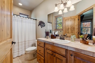 Come explore this stunning single-level residence on the 10th on Eagle Bend Golf Course in Montana - for sale on GolfHomes.com, golf home, golf lot