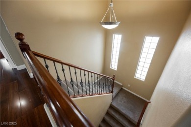Live a Luxury Lifestyle in Tudor Park at Queensridge. Step into on Badlands Golf Club in Nevada - for sale on GolfHomes.com, golf home, golf lot