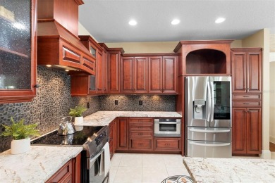 Elegant Pool Home in Glen Eagle in Winter Springs. Situated on a on Tuscawilla Country Club in Florida - for sale on GolfHomes.com, golf home, golf lot