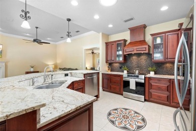 Elegant Pool Home in Glen Eagle in Winter Springs. Situated on a on Tuscawilla Country Club in Florida - for sale on GolfHomes.com, golf home, golf lot