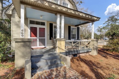 This charming and unique Dutch Colonial-style home is nestled in on Miler Country Club in South Carolina - for sale on GolfHomes.com, golf home, golf lot