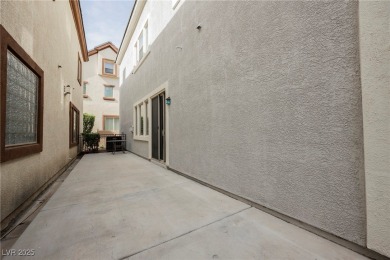 Live a Luxury Lifestyle in Tudor Park at Queensridge. Step into on Badlands Golf Club in Nevada - for sale on GolfHomes.com, golf home, golf lot