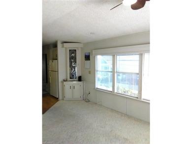 Land Included with home. Great value on this furnished Park on The Rookery At Marco in Florida - for sale on GolfHomes.com, golf home, golf lot