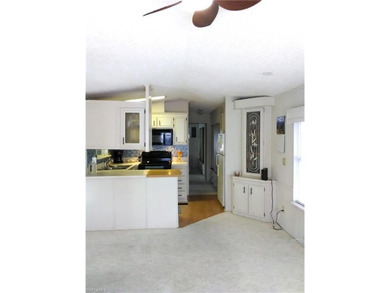 Land Included with home. Great value on this furnished Park on The Rookery At Marco in Florida - for sale on GolfHomes.com, golf home, golf lot