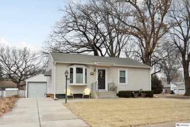 Welcome to this charming 3 bedroom, 3 stall garage home on Jim Ager Memorial Junior Golf Course in Nebraska - for sale on GolfHomes.com, golf home, golf lot