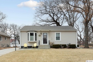 Welcome to this charming 3 bedroom, 3 stall garage home on Jim Ager Memorial Junior Golf Course in Nebraska - for sale on GolfHomes.com, golf home, golf lot