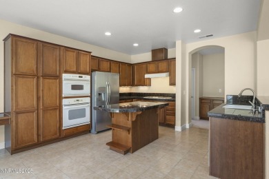 Welcome to your serene oasis at 8925 Chipshot Trail in the heart on Somersett Country Club in Nevada - for sale on GolfHomes.com, golf home, golf lot
