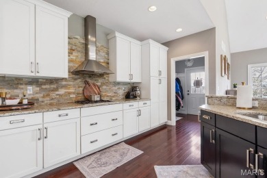 Discover this stunning 1.5-story home offering the perfect blend on Fox Creek Golf Club in Illinois - for sale on GolfHomes.com, golf home, golf lot