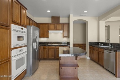 Welcome to your serene oasis at 8925 Chipshot Trail in the heart on Somersett Country Club in Nevada - for sale on GolfHomes.com, golf home, golf lot