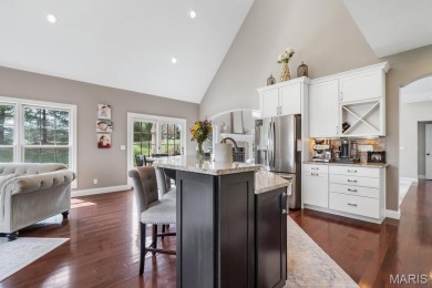 Discover this stunning 1.5-story home offering the perfect blend on Fox Creek Golf Club in Illinois - for sale on GolfHomes.com, golf home, golf lot