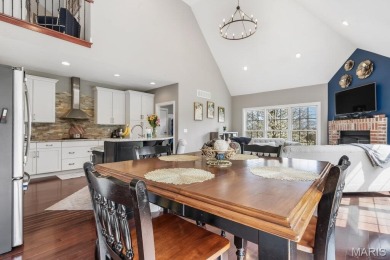 Discover this stunning 1.5-story home offering the perfect blend on Fox Creek Golf Club in Illinois - for sale on GolfHomes.com, golf home, golf lot