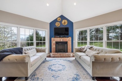 Discover this stunning 1.5-story home offering the perfect blend on Fox Creek Golf Club in Illinois - for sale on GolfHomes.com, golf home, golf lot