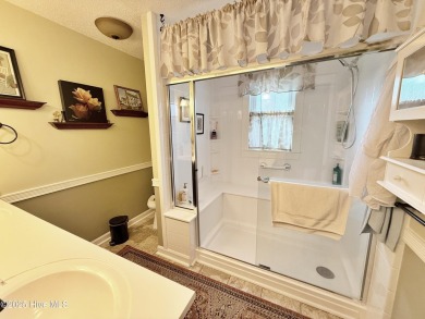 CREAM PUFF ALERT!
This brick home is nestled on a beautifully on River Bend Golf and Country Club in North Carolina - for sale on GolfHomes.com, golf home, golf lot