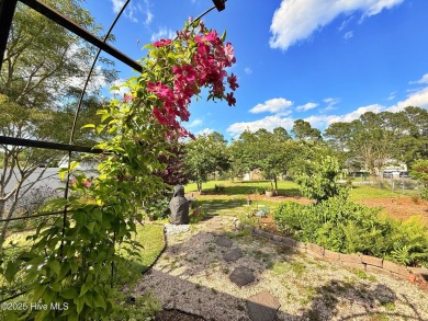 CREAM PUFF ALERT!
This brick home is nestled on a beautifully on River Bend Golf and Country Club in North Carolina - for sale on GolfHomes.com, golf home, golf lot