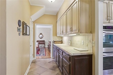 Tucked away on a quiet circle in Atlanta Country Clubs back nine on Atlanta Country Club in Georgia - for sale on GolfHomes.com, golf home, golf lot