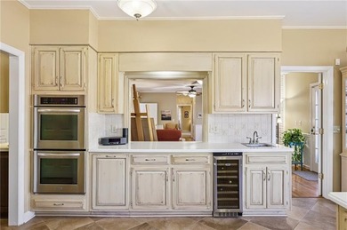 Tucked away on a quiet circle in Atlanta Country Clubs back nine on Atlanta Country Club in Georgia - for sale on GolfHomes.com, golf home, golf lot