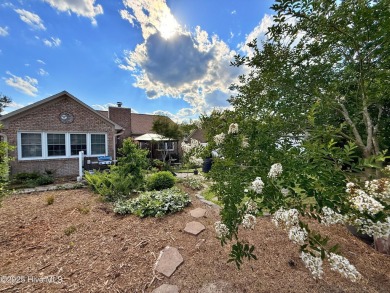 CREAM PUFF ALERT!
This brick home is nestled on a beautifully on River Bend Golf and Country Club in North Carolina - for sale on GolfHomes.com, golf home, golf lot