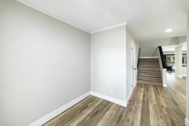 Annual tenant -Investor ready...beautifully renovated 3-bedroom on The President Country Club in Florida - for sale on GolfHomes.com, golf home, golf lot