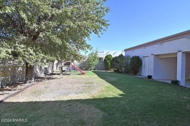 This stunning 2818 square foot residence in the highly desirable on New Mexico St Univ Golf Course in New Mexico - for sale on GolfHomes.com, golf home, golf lot