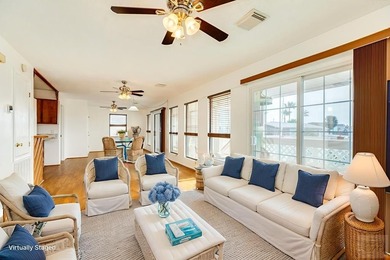 CHARMING THREE-BEDROOM CANAL HOME IN JAMAICA BEACH has a on Galveston Country Club in Texas - for sale on GolfHomes.com, golf home, golf lot