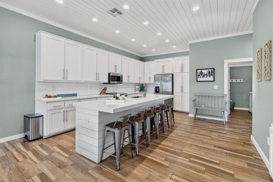 CUSTOM HOME IN THE HEART OF TOWN! 'Making Waves' is the 3 story on Palmilla Beach Golf Club in Texas - for sale on GolfHomes.com, golf home, golf lot