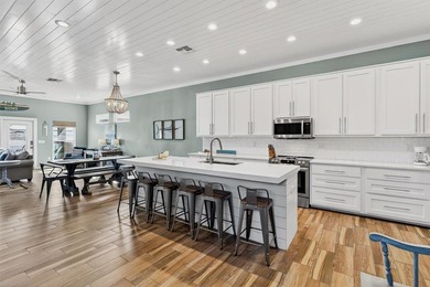 CUSTOM HOME IN THE HEART OF TOWN! 'Making Waves' is the 3 story on Palmilla Beach Golf Club in Texas - for sale on GolfHomes.com, golf home, golf lot