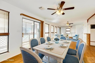 CHARMING THREE-BEDROOM CANAL HOME IN JAMAICA BEACH has a on Galveston Country Club in Texas - for sale on GolfHomes.com, golf home, golf lot