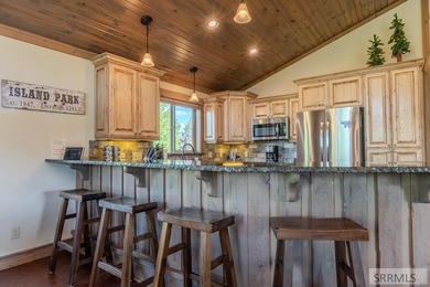 Modern Mountain Escape on the Golf Course! Experience mountain on Island Park Village Resort Golf Course in Idaho - for sale on GolfHomes.com, golf home, golf lot