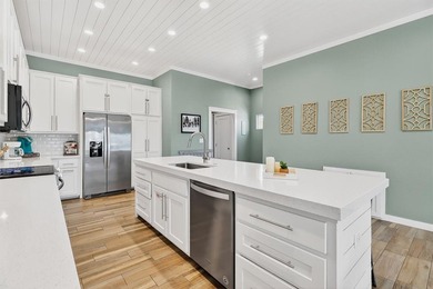 CUSTOM HOME IN THE HEART OF TOWN! 'Making Waves' is the 3 story on Palmilla Beach Golf Club in Texas - for sale on GolfHomes.com, golf home, golf lot