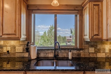Modern Mountain Escape on the Golf Course! Experience mountain on Island Park Village Resort Golf Course in Idaho - for sale on GolfHomes.com, golf home, golf lot