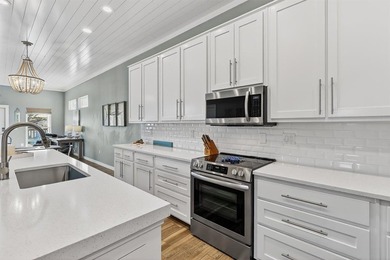 CUSTOM HOME IN THE HEART OF TOWN! 'Making Waves' is the 3 story on Palmilla Beach Golf Club in Texas - for sale on GolfHomes.com, golf home, golf lot