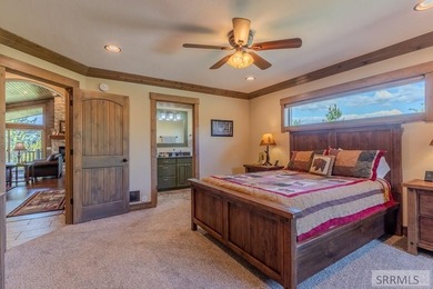Modern Mountain Escape on the Golf Course! Experience mountain on Island Park Village Resort Golf Course in Idaho - for sale on GolfHomes.com, golf home, golf lot
