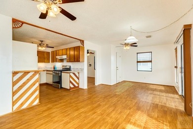 CHARMING THREE-BEDROOM CANAL HOME IN JAMAICA BEACH has a on Galveston Country Club in Texas - for sale on GolfHomes.com, golf home, golf lot