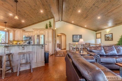 Modern Mountain Escape on the Golf Course! Experience mountain on Island Park Village Resort Golf Course in Idaho - for sale on GolfHomes.com, golf home, golf lot