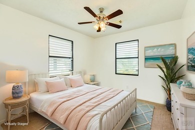 CHARMING THREE-BEDROOM CANAL HOME IN JAMAICA BEACH has a on Galveston Country Club in Texas - for sale on GolfHomes.com, golf home, golf lot