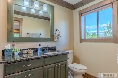 Modern Mountain Escape on the Golf Course! Experience mountain on Island Park Village Resort Golf Course in Idaho - for sale on GolfHomes.com, golf home, golf lot