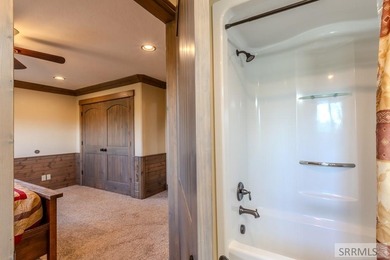 Modern Mountain Escape on the Golf Course! Experience mountain on Island Park Village Resort Golf Course in Idaho - for sale on GolfHomes.com, golf home, golf lot