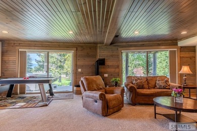 Modern Mountain Escape on the Golf Course! Experience mountain on Island Park Village Resort Golf Course in Idaho - for sale on GolfHomes.com, golf home, golf lot