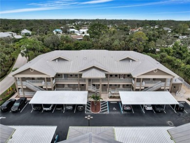 This first floor condo overlooks the tranquil waterway of Indian on Riverbend Golf and Country Club in Florida - for sale on GolfHomes.com, golf home, golf lot